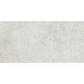 A textured light gray ceramic tile with a subtle speckled pattern select nebbia matt 30 x 60cm