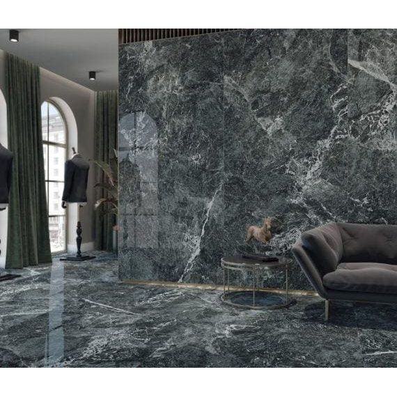 Dark green marble wall with swirling white veining in polished serie saint denis stone panel