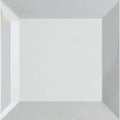 A minimalist white cube silver mirror bevel finishing piece with smooth clean lines and a matte finish