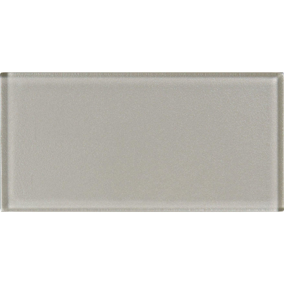 A sleek rectangular glass tile starcia metallica brick in metallic gray with a smooth slightly textured surface