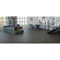 Tanum Plomo Matt 60 x 60cm dark grey concrete-effect tiles with a grey sectional sofa
