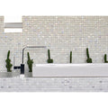 White mosaic tile backsplash with subtle iridescent sheen in textured glass for kitchen or bathroom walls