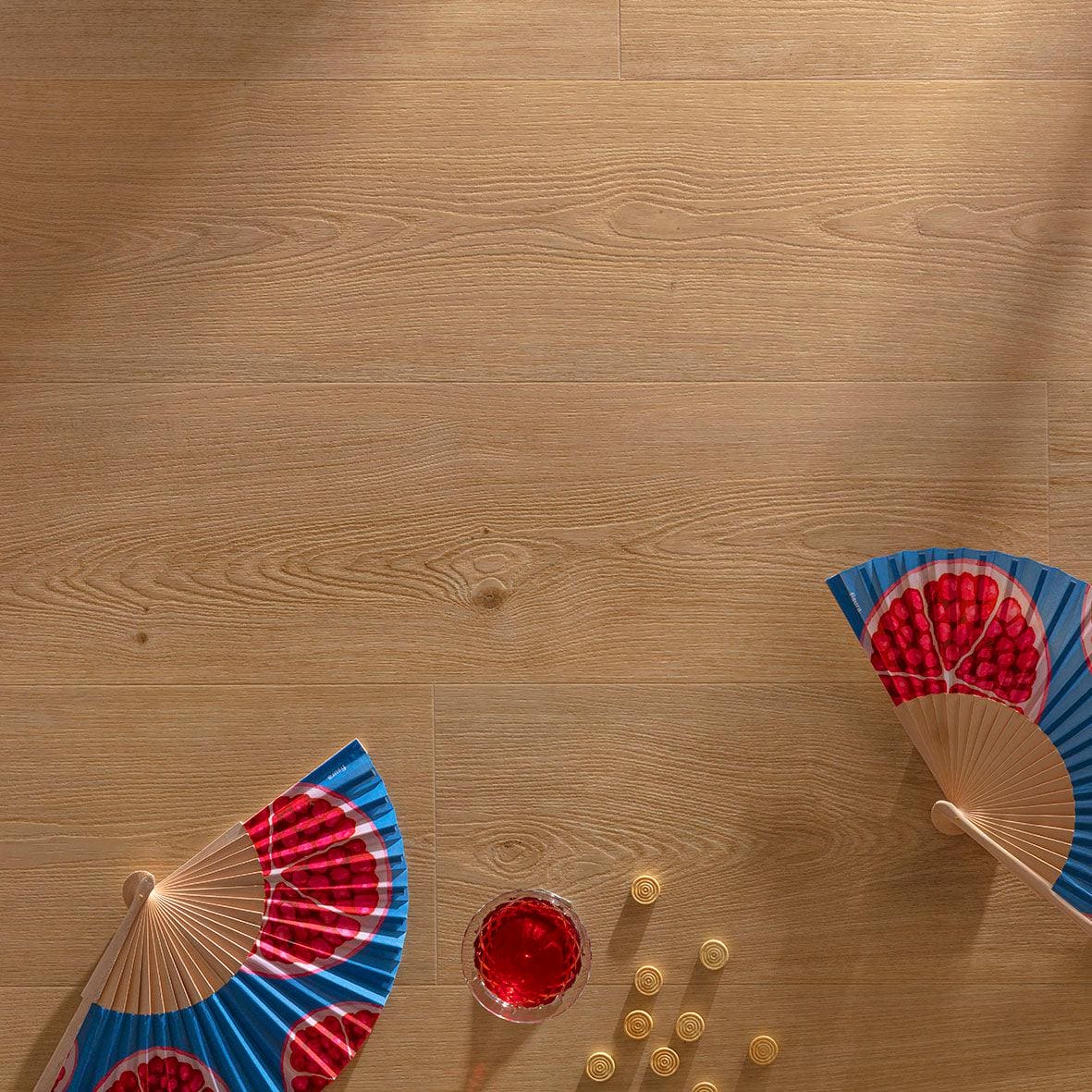 Blue and red grape patterned folding fans on light wood toffee f098 xl vinyl plank flooring