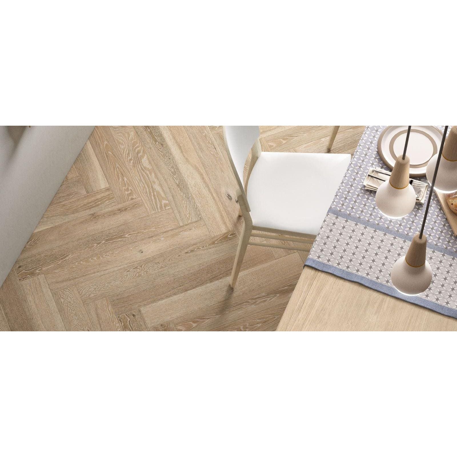 Light-colored wood herringbone floor tiles in tree-charme beige matt finish for elegant interior flooring