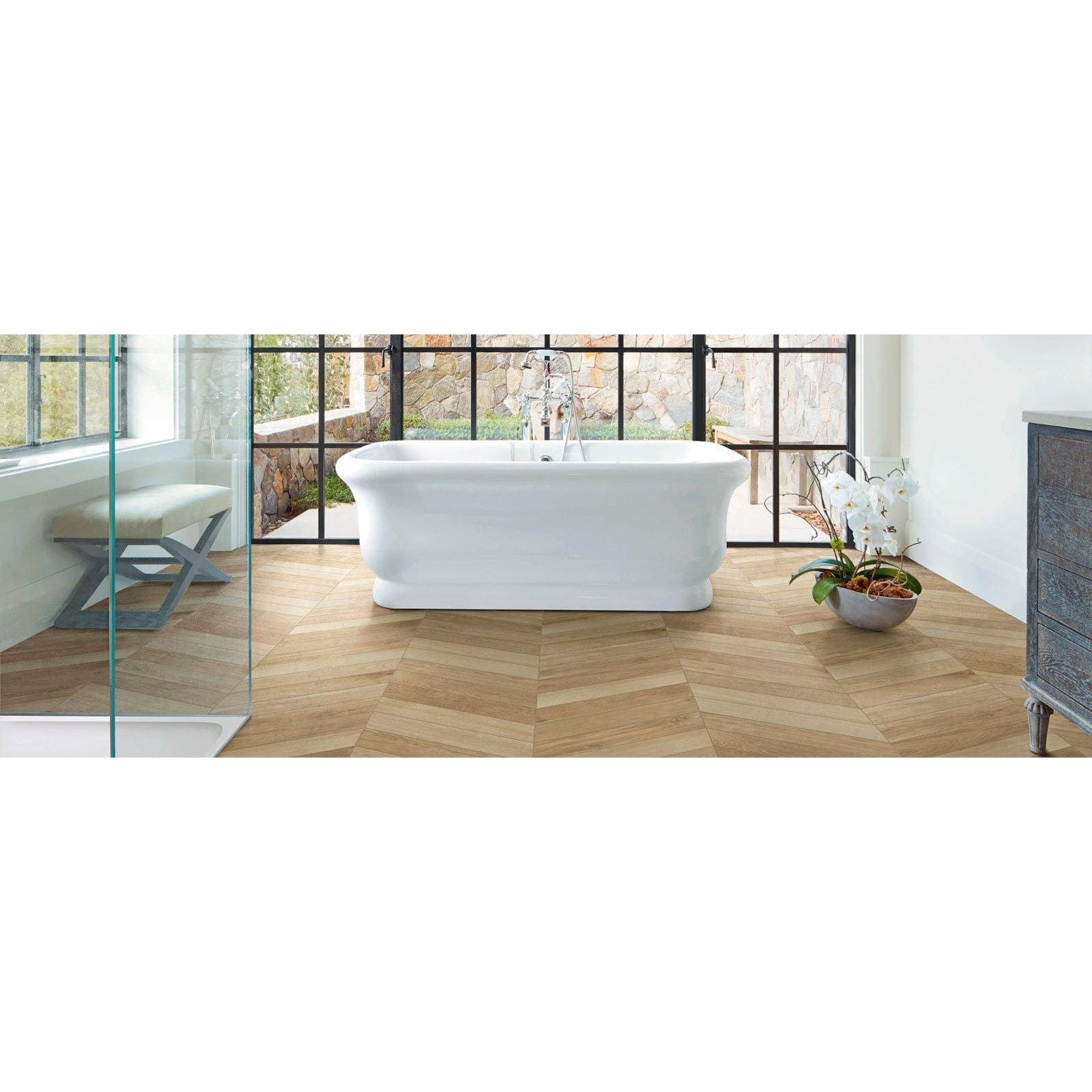 White freestanding bathtub with classic elegant design and smooth porcelain finish in tree soul neutral chevron matt