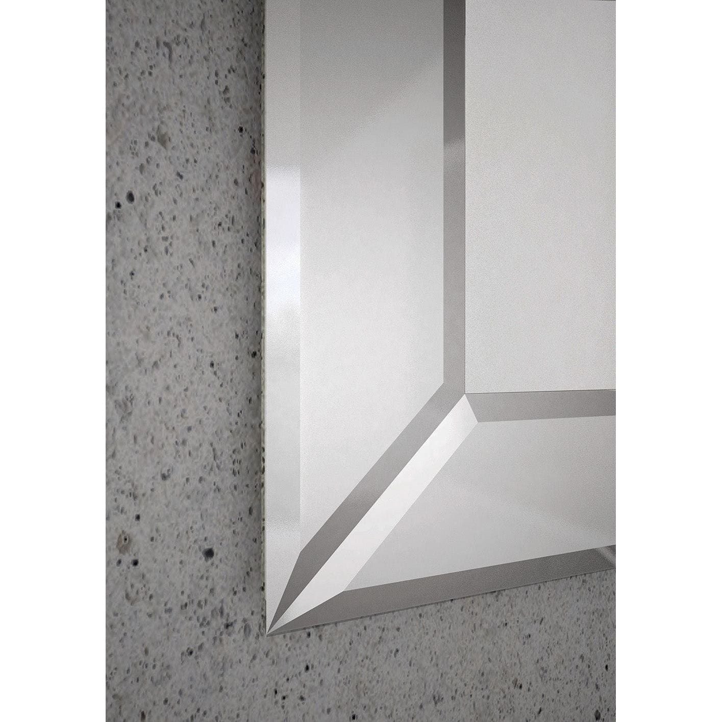Modern geometric Verona mirror with a sleek silver metallic frame and sharp angular design for contemporary decor