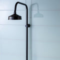 Volga Clear Glass 398 x 198mm light grey glass tiles with a showerhead
