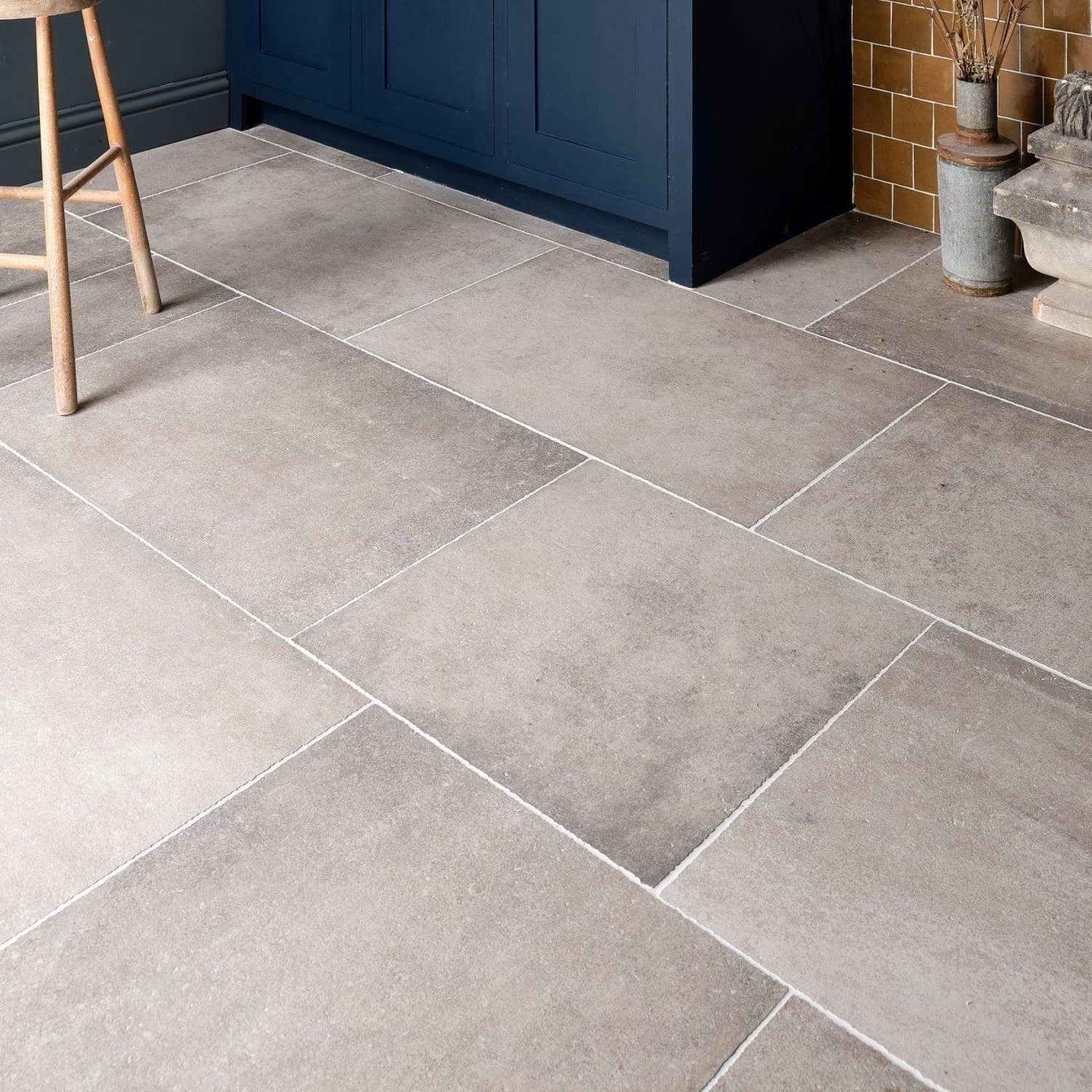 Wetherby porcelain gray stone effect floor tiles with subtle texture and white grout lines