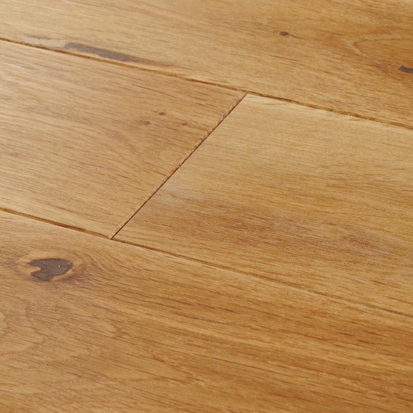 Light brown york rustic oak hardwood floor planks with natural wood grain and subtle knots