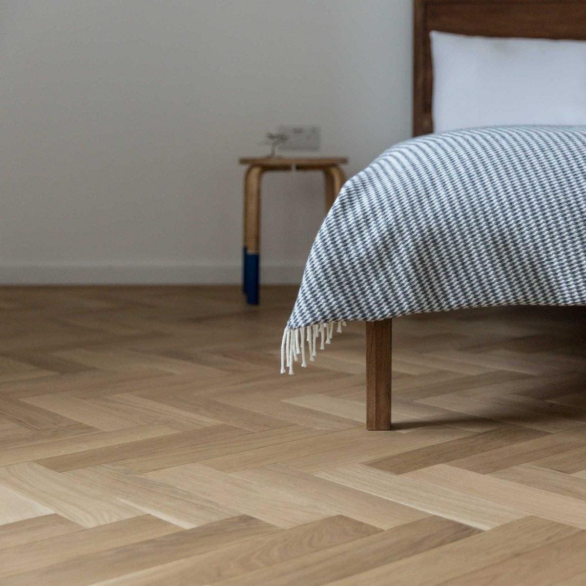ZB108 Natural Oak natural oak engineered wood flooring with a herringbone throw