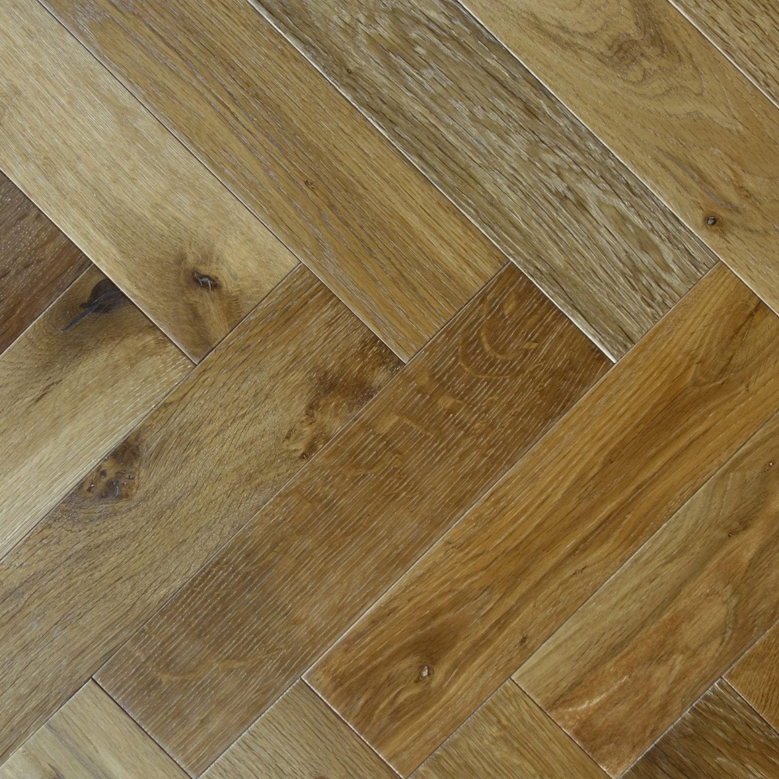 Warm-toned hardwood flooring zb201 smoked oak with herringbone pattern and natural wood grain finish