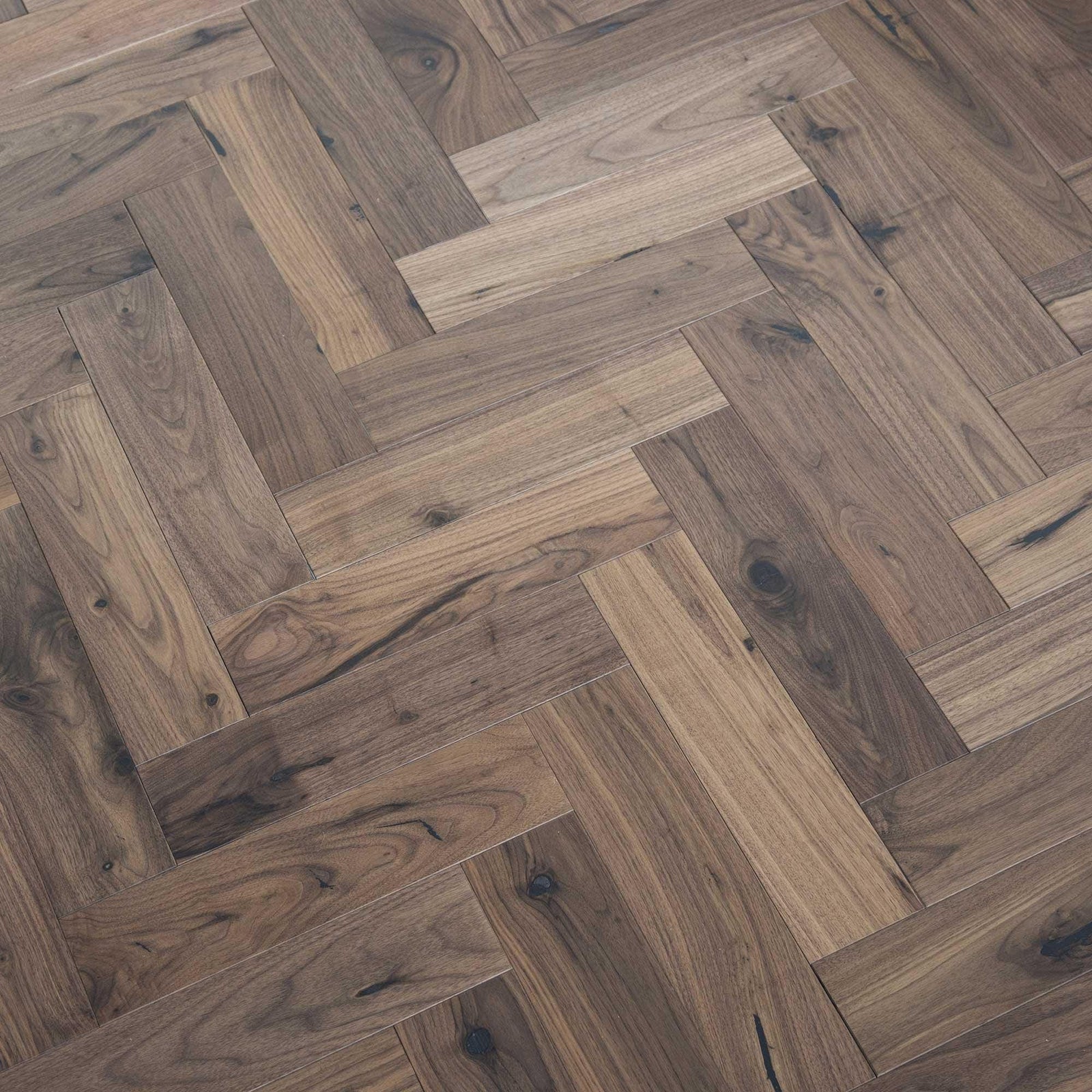 Dark walnut hardwood flooring with herringbone pattern in zb205 black walnut for stylish interior use